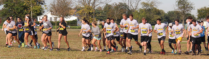 Group of participants beginning a run