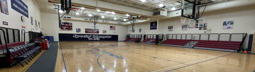 a basketball court with a basketball hoop